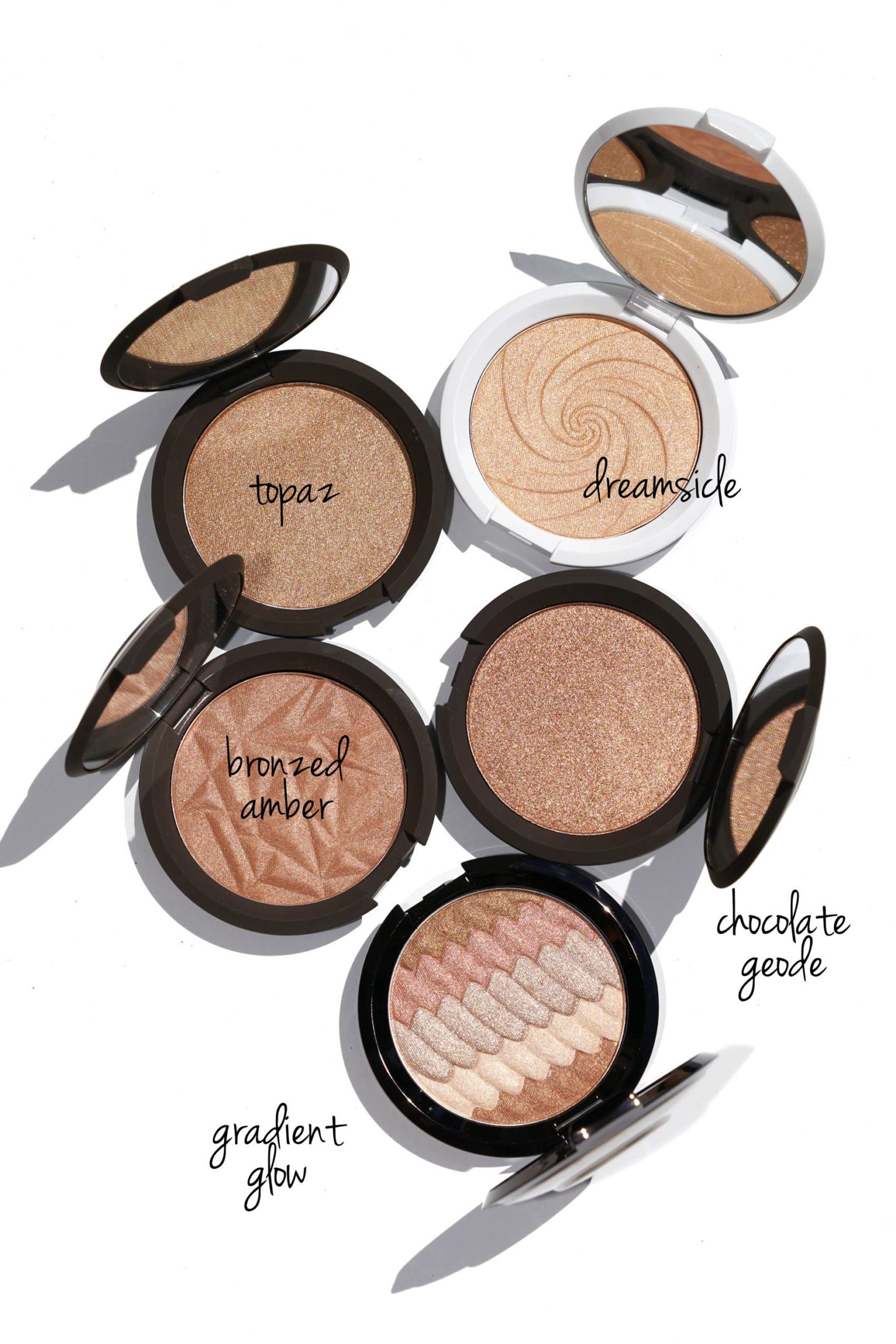 Becca Shimmering Skin Perfector Pressed Topaz, Dreamsicle, Bronzed Amber, Chocolate Geode and Gradient Glow swatches