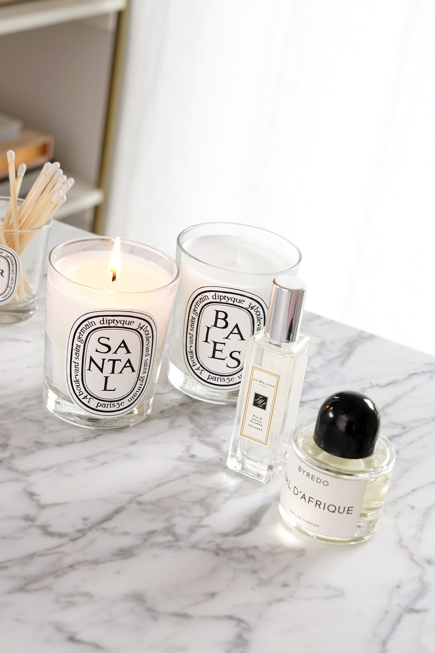 Best Scents for Fall Diptyque Santal, Baies, Byredo