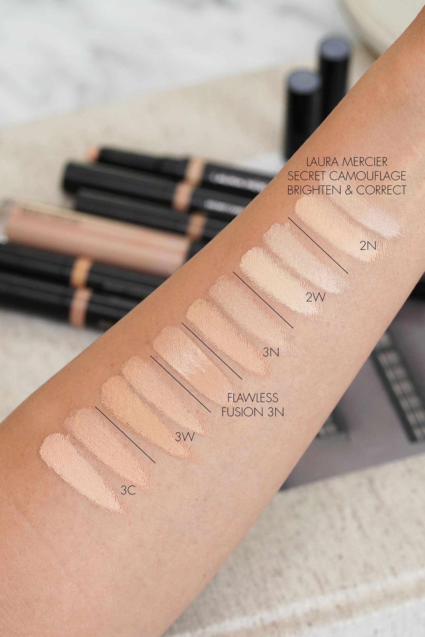 Laura Mercier Secret Camouflage Correct and Brighten Concealer Duo swatches 2 and 3 family