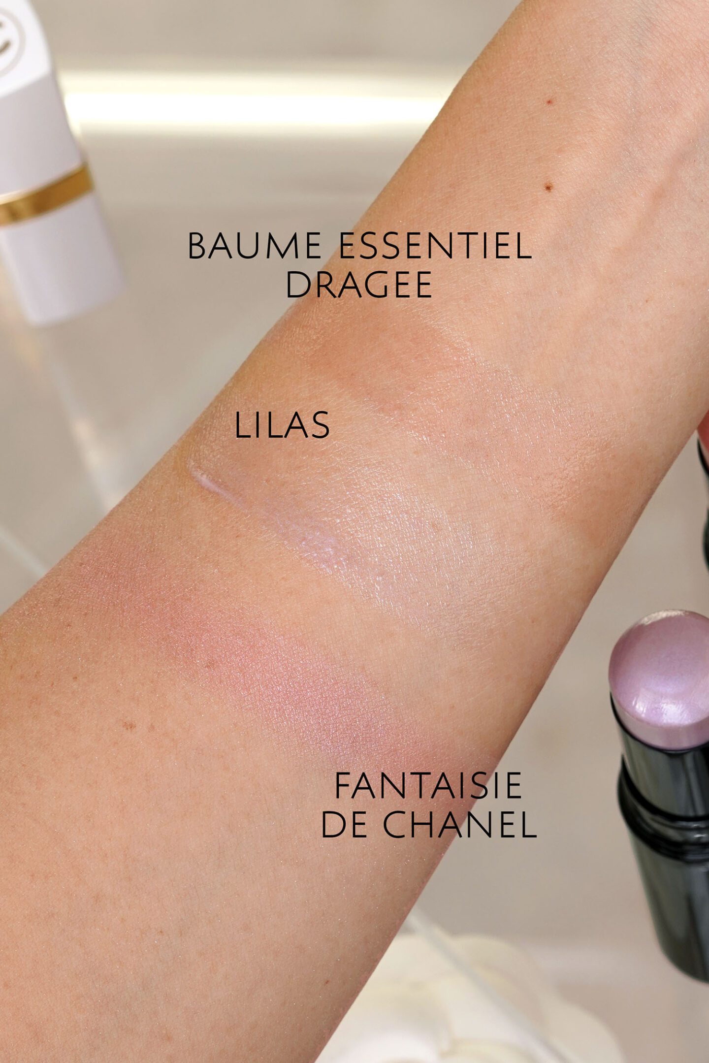 Chanel Baume Essentiel in Lilas and Dragee swatches