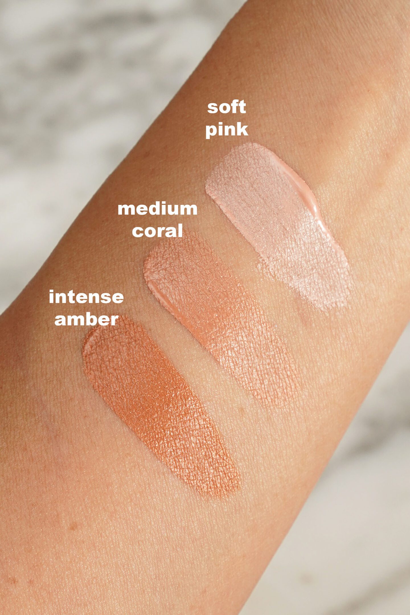 No 1 de Chanel Skin Enhancer Swatches Soft Pink and Medium Coral and Intense Amber