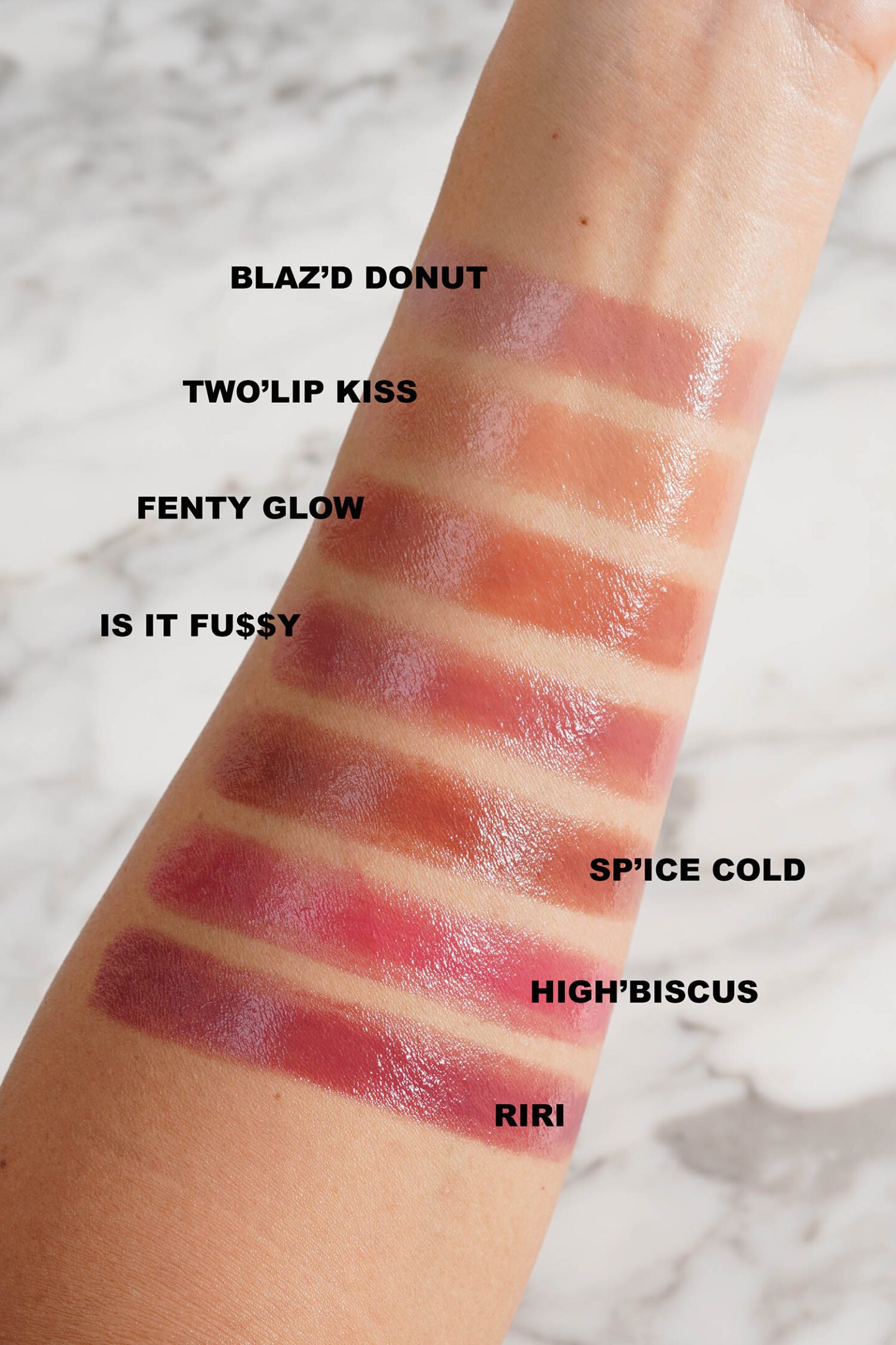 Fenty Gloss Bomb Stix swatches via The Beauty Lookbook