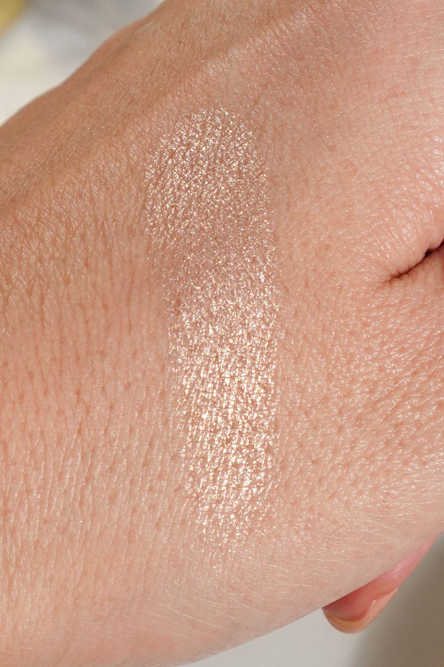 Dior Forever Couture Luminizer 001 Or Lumiere swatch via The Beauty Lookbook